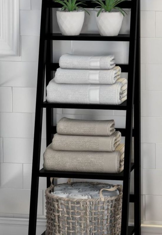 Ladder shelf for bathroom storage ideas, perfect for towels and small bathroom decor.