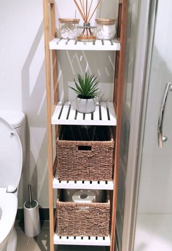 Compact shelf unit for small bathroom storage ideas and efficient space utilization.